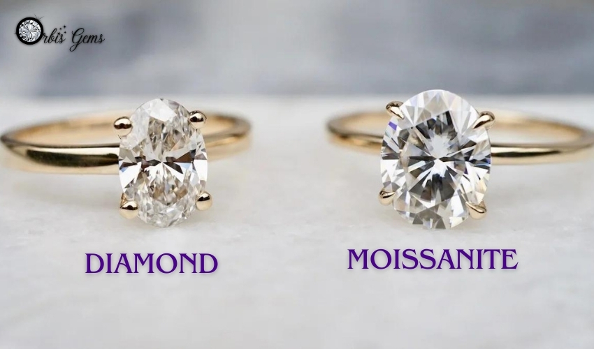 Two gold rings with central gemstones on a marble surface, one with diamond and the other with moissanite, comparing aesthetics in the 'moissanite vs diamond' debate.